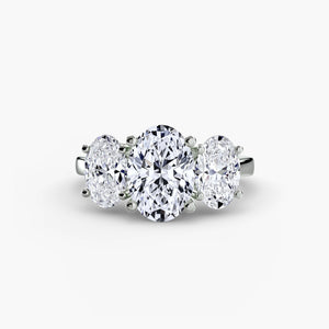 Trilogy Oval ring - classic three-stone engagement ring featuring an oval center diamond with two side diamonds