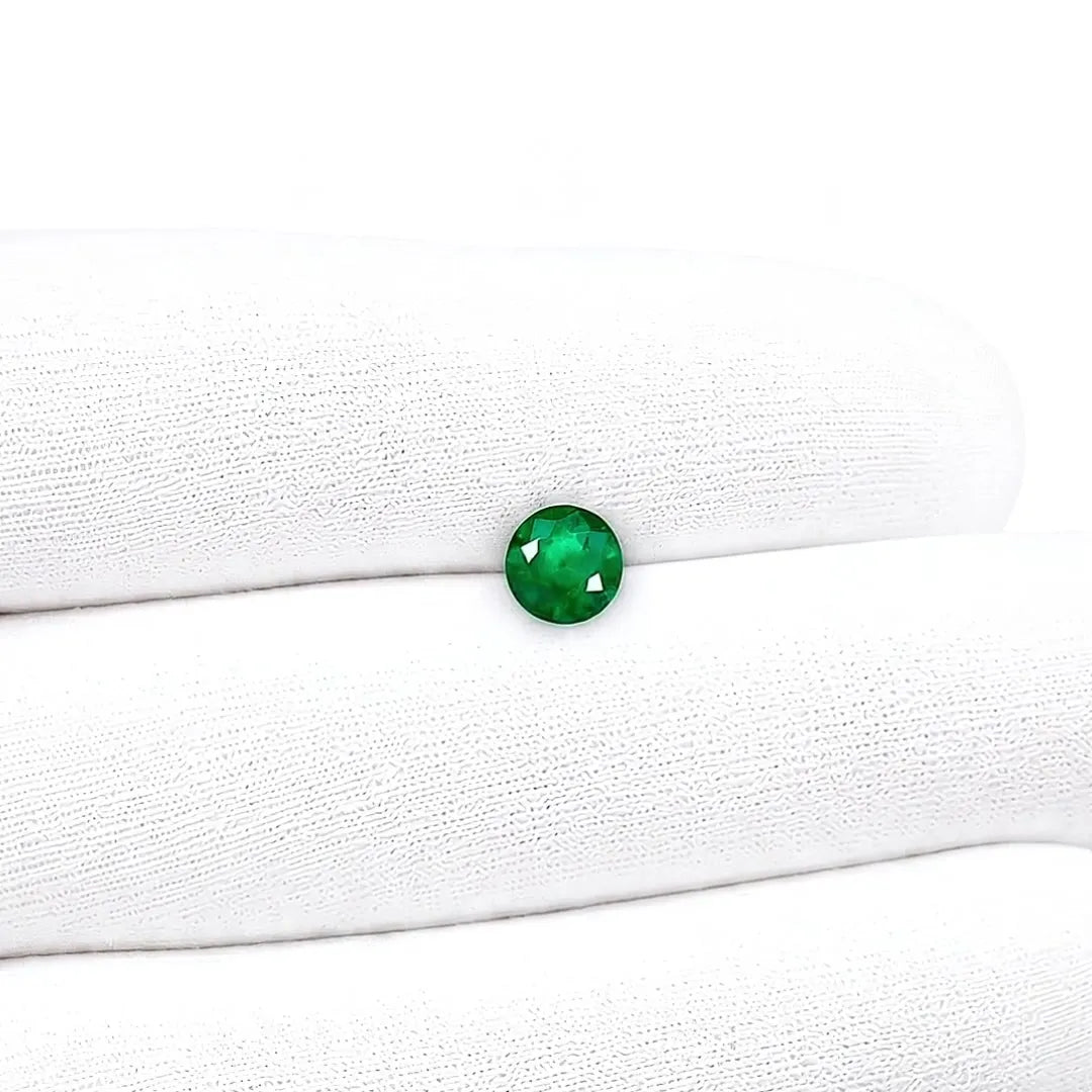 1.11ct Round Natural Emerald (Colour Green, Clarity Slightly Included, Cut Faceted)