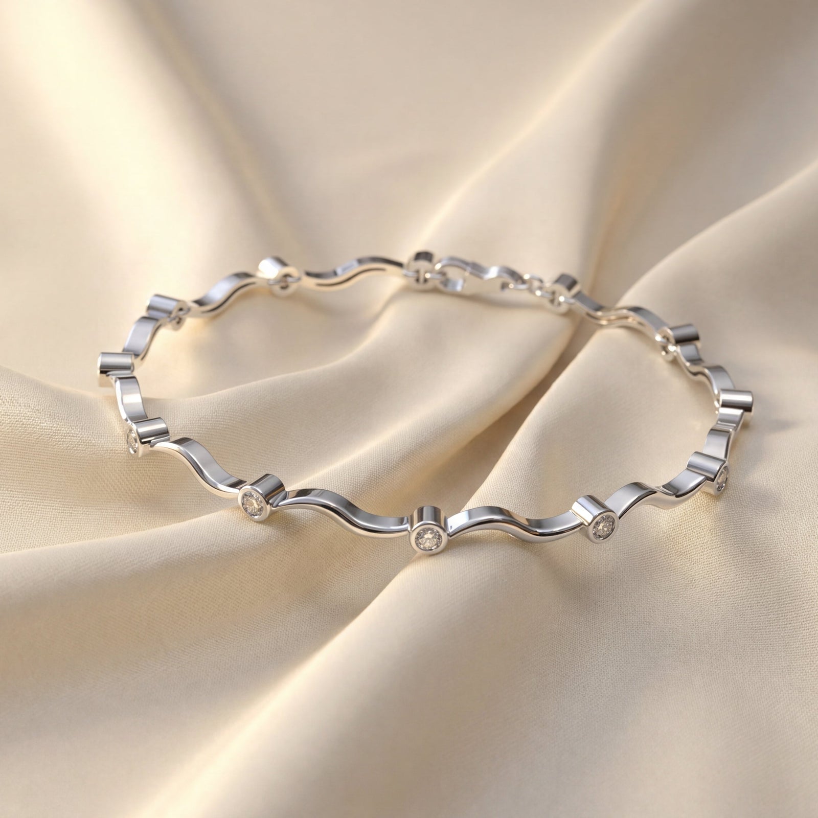 18ct Whiter gold curve shaped bracelet with round brilliant cut diamonds
