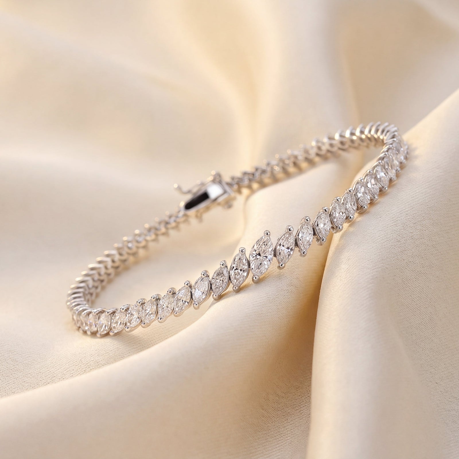 18ct Yellow gold bracelet with  marquise cut shaped diamonds