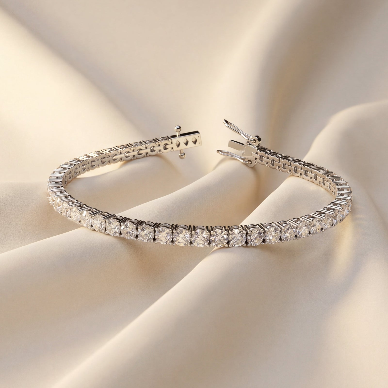 18ct white gold line bracelet with round brilliant cut diamonds  on a beige fabric background