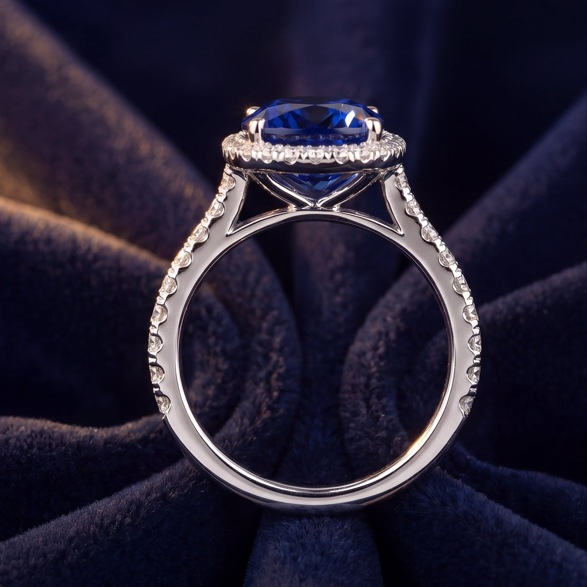 Bespoke_Oval_Blue_Sapphire_Diamond_Halo_Engagement_Ring