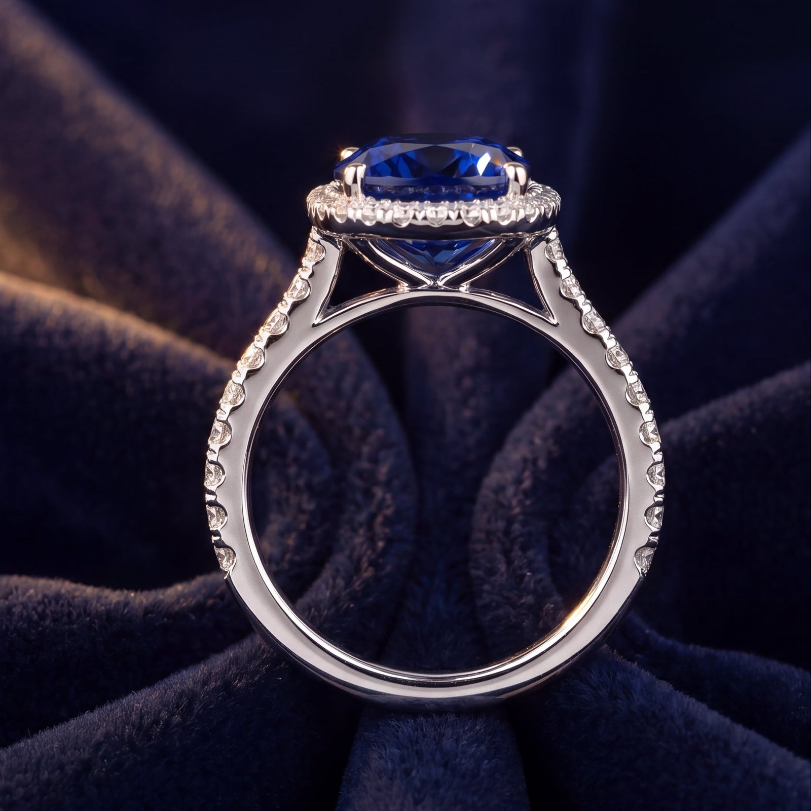 Oval Blue Sapphire & Diamond Halo Engagement Ring