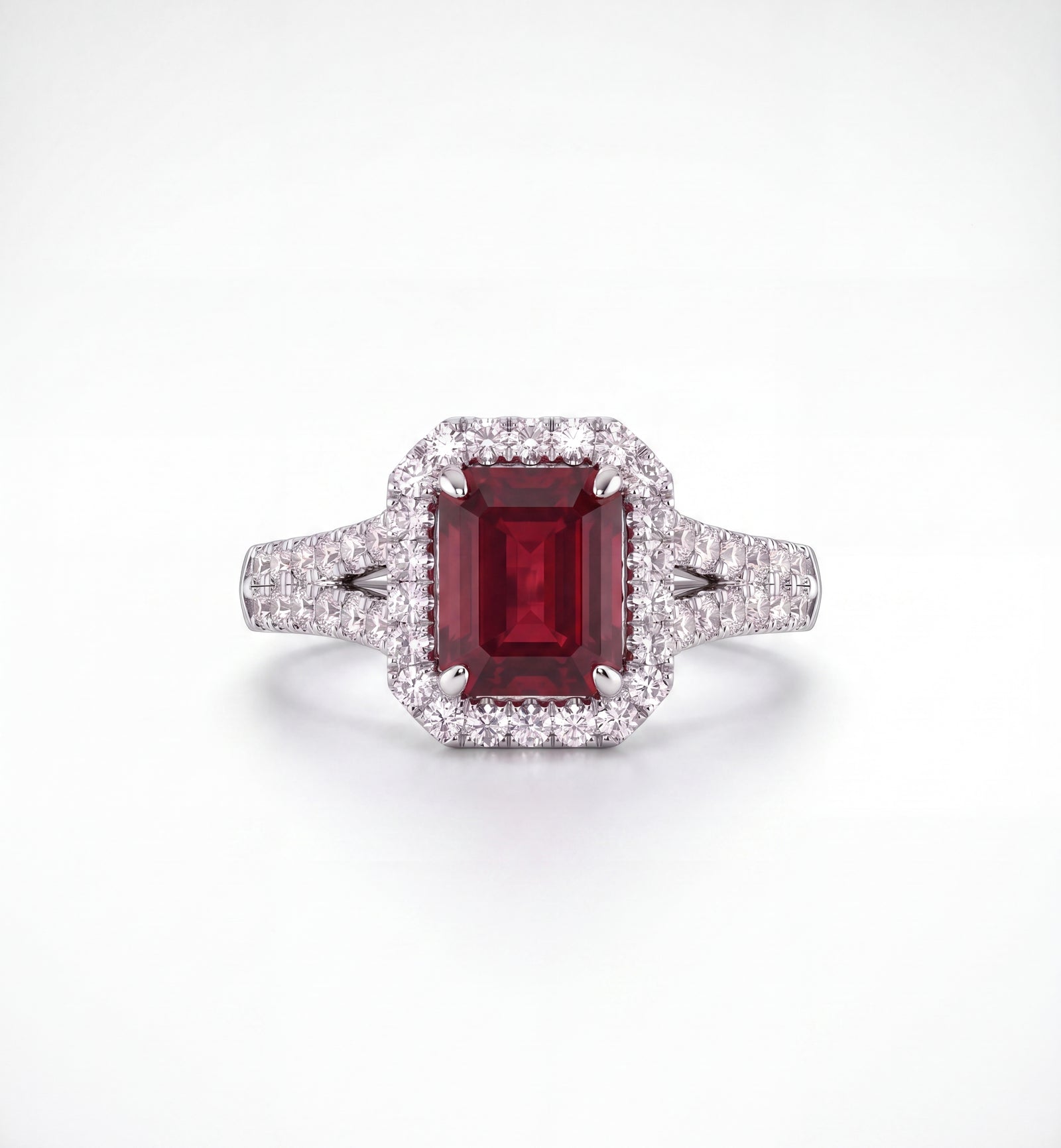 Bespoke ruby cluster ring with diamond-set shoulders, made in Hatton Garden