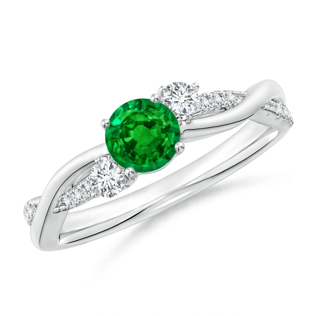 White metal ring with a twisted vine band, a round green stone and a round white stone each side
