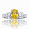 Fancy Yellow Diamond Three-Stone Ring