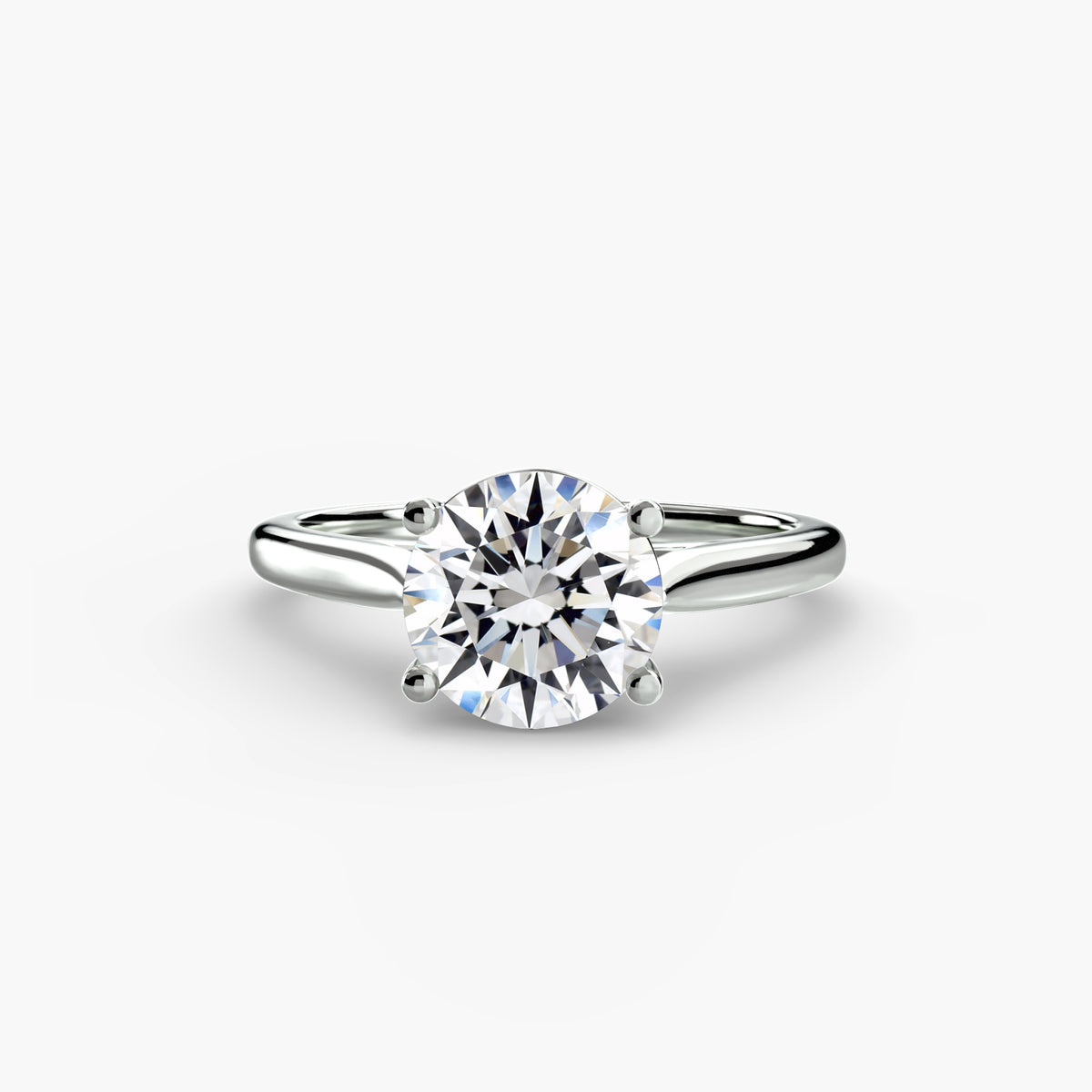 Solitaire ring 1 - classic engagement ring featuring a single stunning diamond set on a simple, elegant band