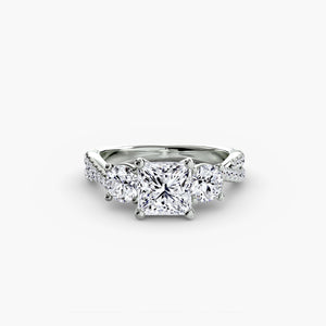 Three-stone ring with pavé band 2 - timeless engagement ring featuring a central diamond with side stones and pavé detailing on the band