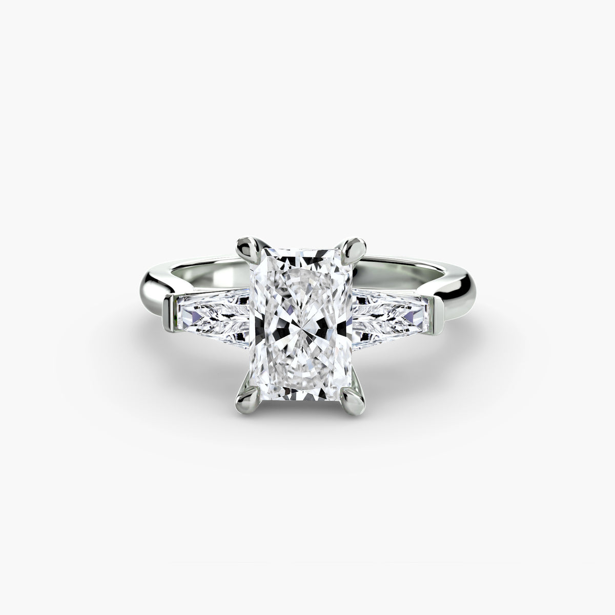 Three-stone ring with baguette side stones - classic engagement ring with timeless design