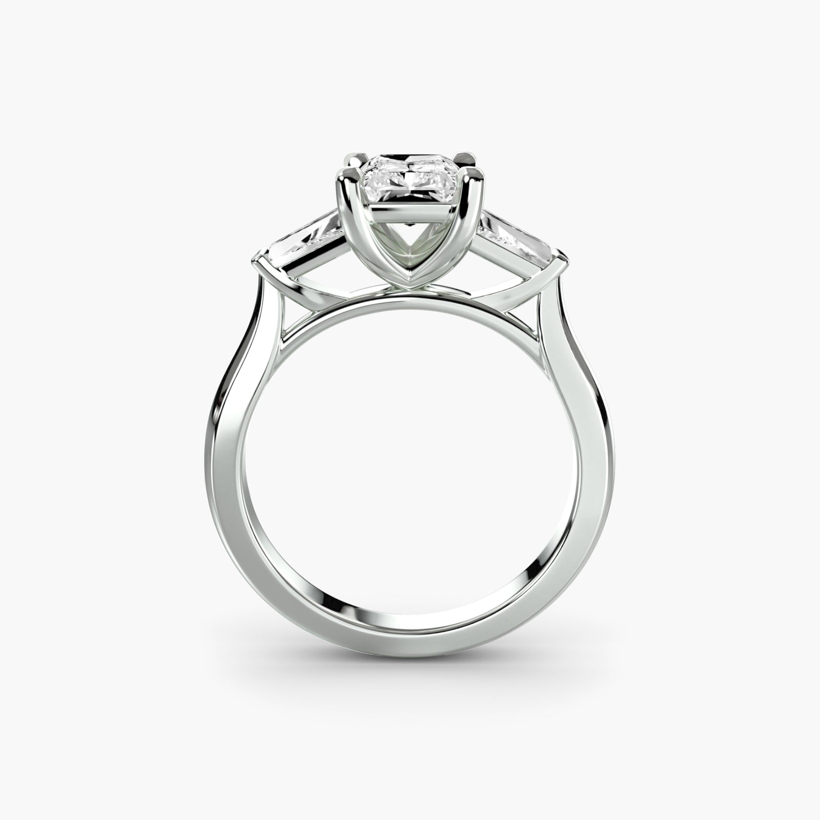 Three-stone ring with baguette side stones - classic engagement ring with timeless design