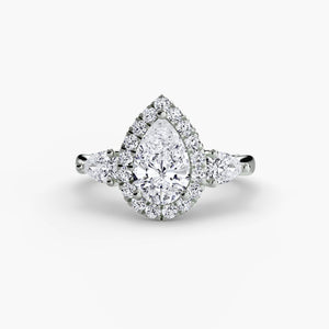 Three-stone ring with halo - classic engagement ring featuring center diamond surrounded by a halo of smaller diamonds