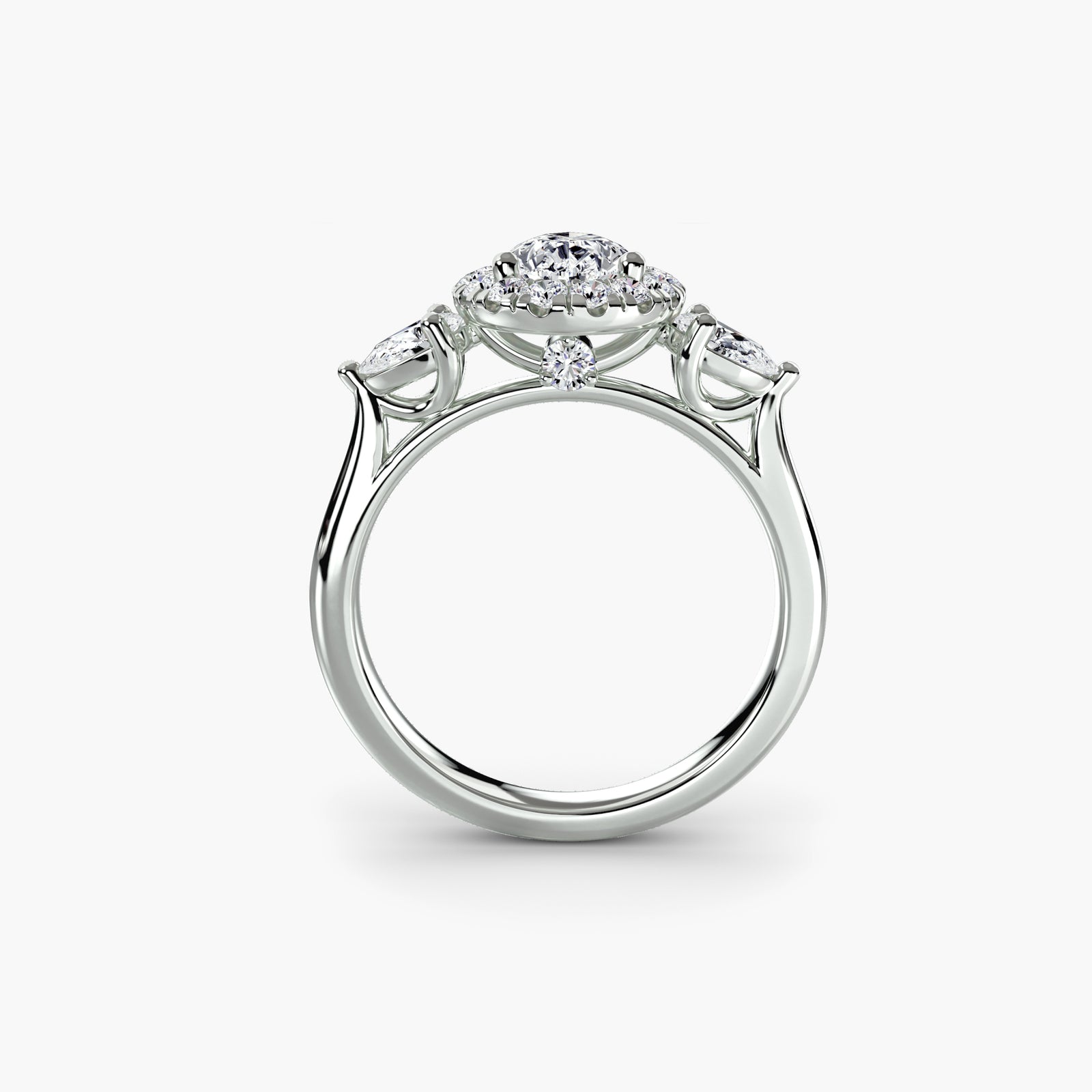Three-stone ring with halo - classic engagement ring featuring center diamond surrounded by a halo of smaller diamonds
