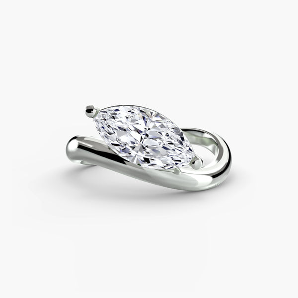 The Wave Ring - elegant wave-shaped design with diamond accents, finished by hand in Hatton Garden