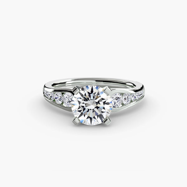 Solitaire with pavé 2 - classic engagement ring featuring a central diamond with pavé diamond accents on the band for added brilliance