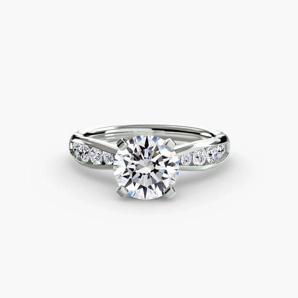 Solitaire with pavé 3 - elegant engagement ring featuring a central diamond with pavé diamond detailing on the band for extra sparkle
