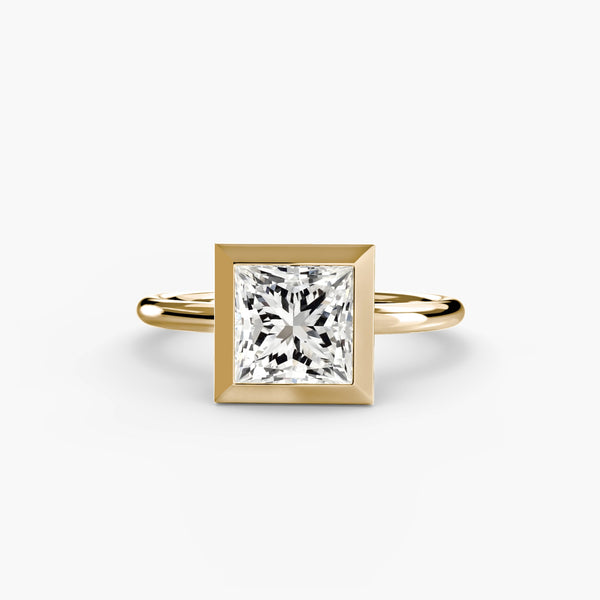 Princess-cut diamond solitaire engagement ring in a bezel setting