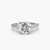 Solitaire with pavé 4 - classic engagement ring featuring a central diamond with pavé diamond detailing on the band for added sparkle