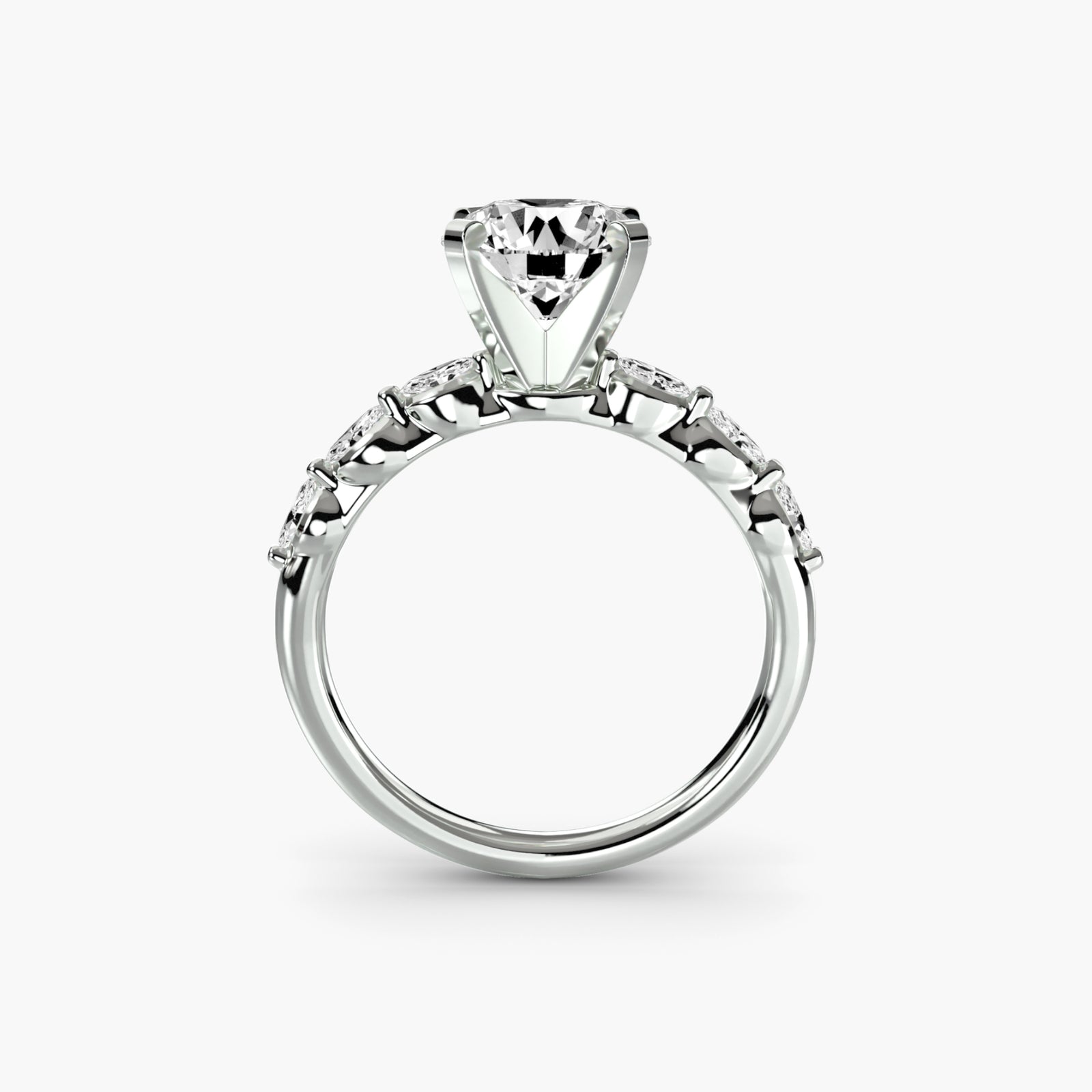 The Floral Accent Solitaire - elegant engagement ring featuring a central diamond with delicate floral-inspired accents on the band