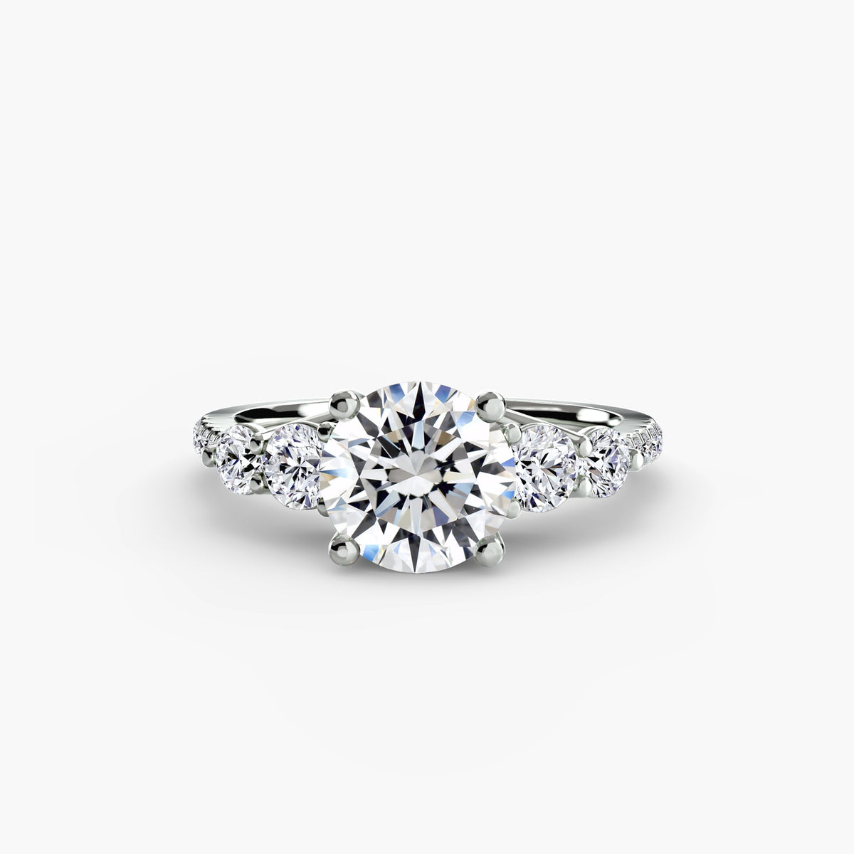 Five stone ring with pavé band - timeless engagement ring featuring five diamonds with pavé diamond detailing on the band