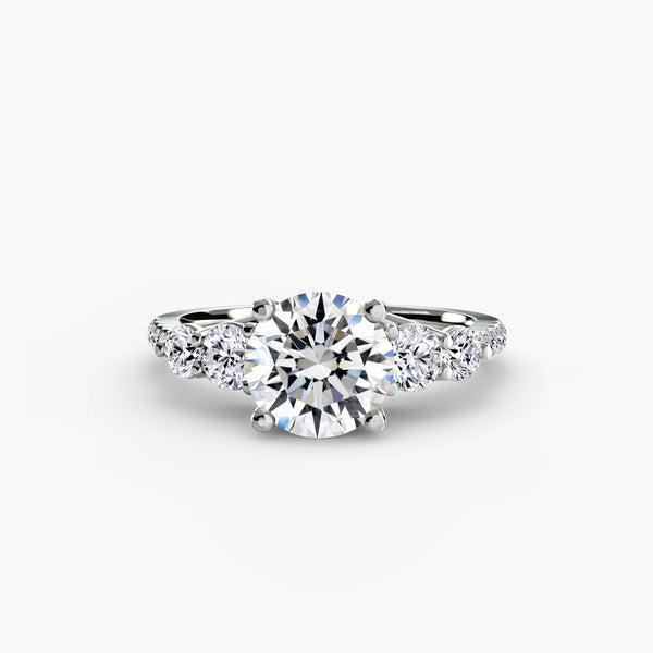 Five stone ring with pavé band - timeless engagement ring featuring five diamonds with pavé diamond detailing on the band