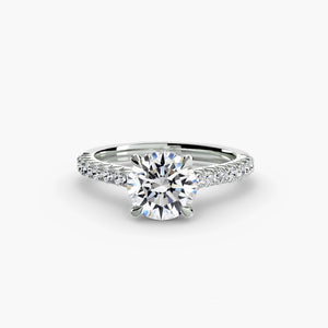 Solitaire with pavé 5 - timeless engagement ring featuring a single diamond with pavé diamond detailing on the band