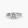 Solitaire with pavé 7 - elegant engagement ring featuring a single diamond with pavé diamond detailing on the band