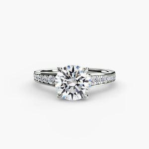 Solitaire with pavé 7 - elegant engagement ring featuring a single diamond with pavé diamond detailing on the band
