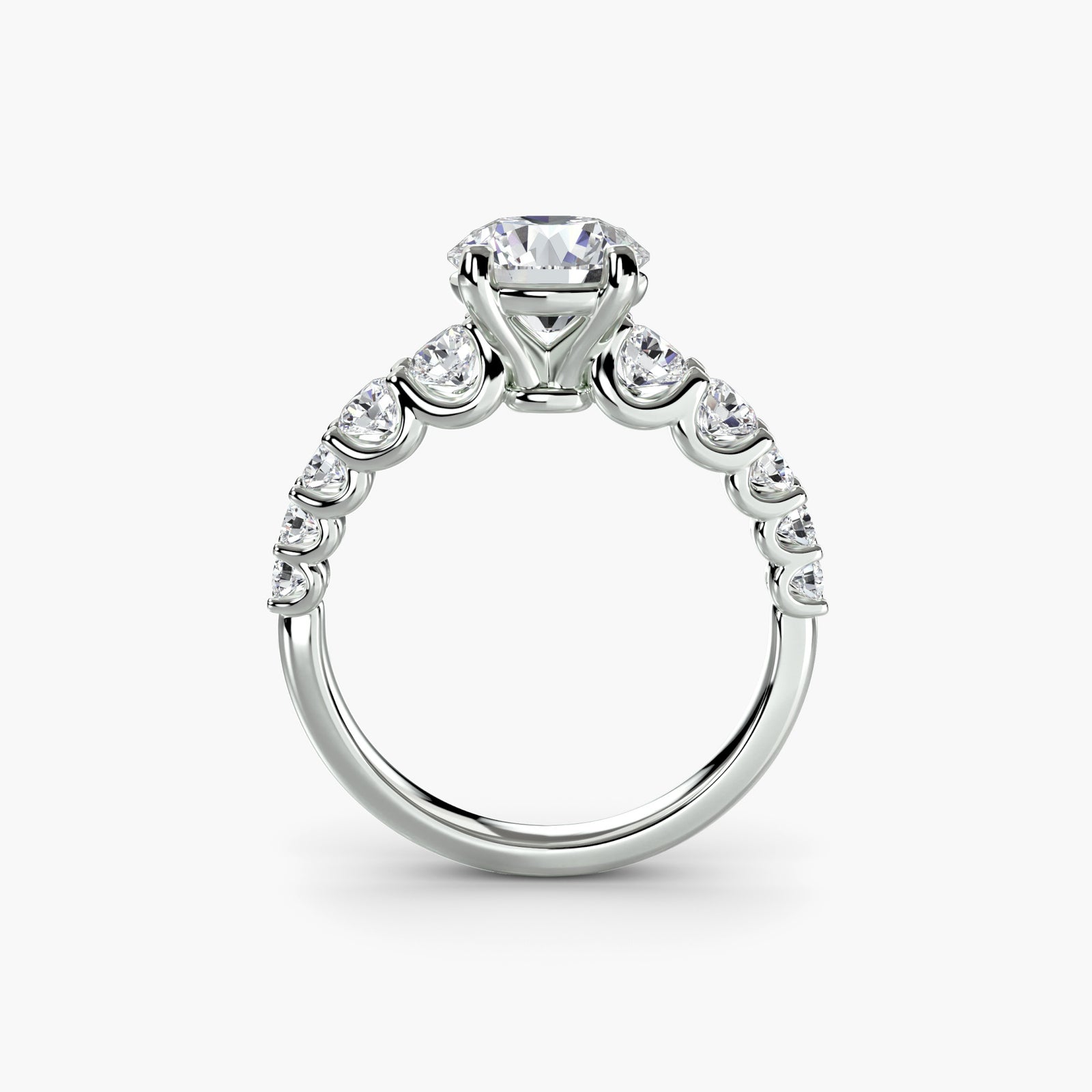 The Graduated Accent Ring - sophisticated design featuring a central diamond with graduated accent diamonds for added elegance