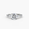 The Tiered Accent Ring - elegant design featuring a central diamond with tiered accent diamonds on the band for a sophisticated look