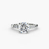Solitaire with shoulder accents - classic engagement ring featuring a central diamond with accent diamonds on the shoulders for added sparkle