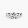 Solitaire with shoulder accents 2 - elegant engagement ring featuring a central diamond with accent diamonds on the shoulders