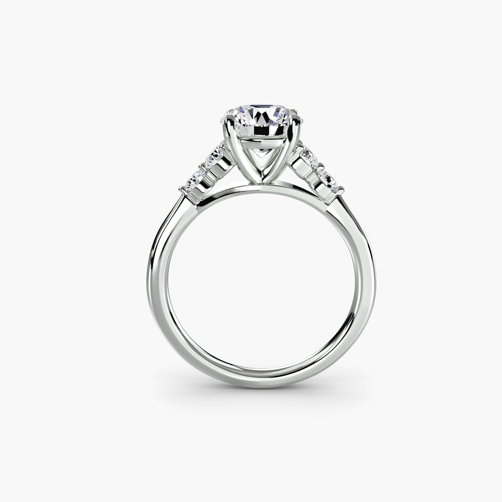 Solitaire with shoulder accents 2 - elegant engagement ring featuring a central diamond with accent diamonds on the shoulders
