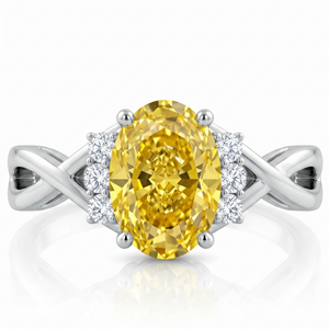 Bespoke fancy yellow diamond serpentine solitaire ring, made in Hatton Garden