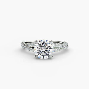 The Twisted Pavé Solitaire - elegant solitaire engagement ring with a twisted band adorned with pavé diamonds