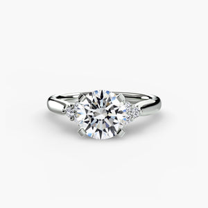 Solitaire with cluster shoulders 2 - elegant engagement ring featuring a central diamond with diamond clusters on the shoulders