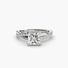 The Emerald Twist Pavé Ring - elegant twist design with emerald-cut diamond and pavé band for a modern, sophisticated look