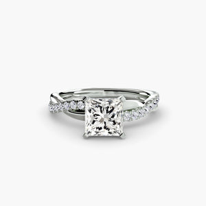 The Emerald Twist Pavé Ring - elegant twist design with emerald-cut diamond and pavé band for a modern, sophisticated look