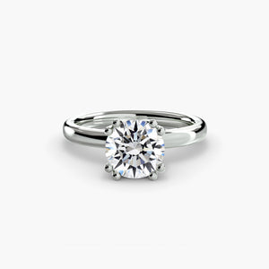 Solitaire ring 5 - classic engagement ring featuring a single stunning diamond set on a simple, elegant band