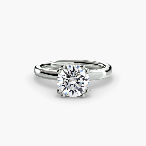 Solitaire ring 5 - classic engagement ring featuring a single stunning diamond set on a simple, elegant band