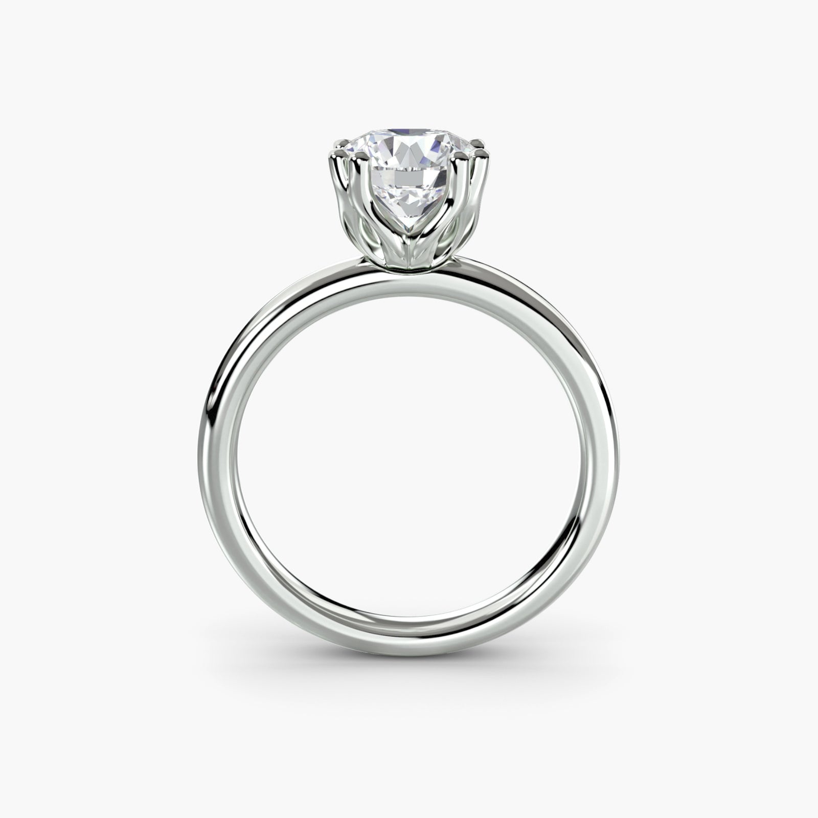 Solitaire ring 5 - classic engagement ring featuring a single stunning diamond set on a simple, elegant band