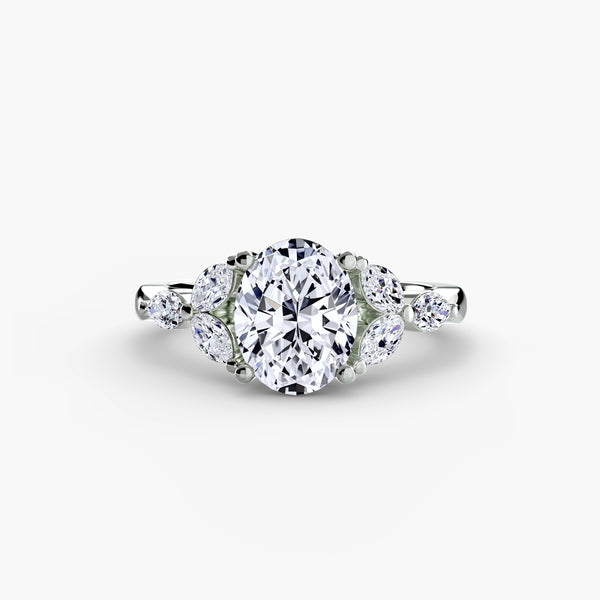The Shoulder Cluster Ring, a made-to-order diamond engagement ring from Hatton Garden Bespoke Jewellery