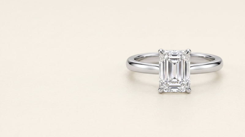 Emerald cut diamond solitaire engagement ring in platinum
