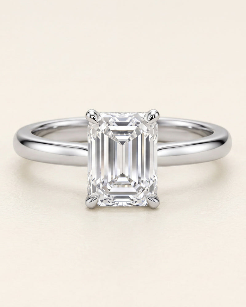 Emerald cut diamond solitaire engagement ring in platinum