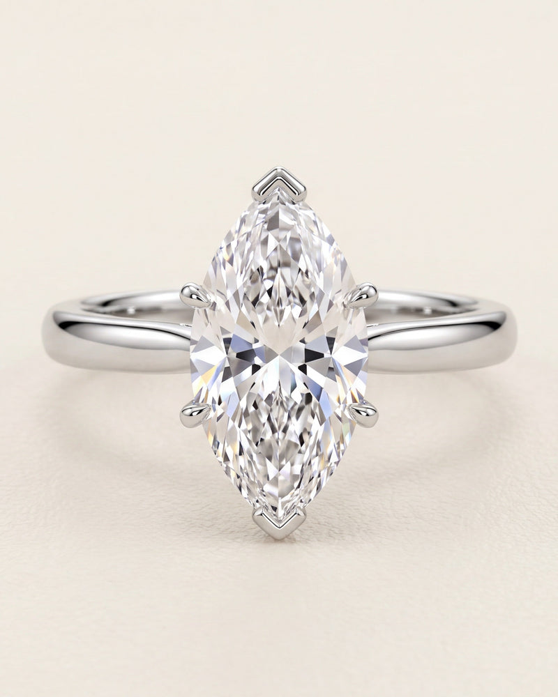 Marquise cut diamond solitaire engagement ring in platinum