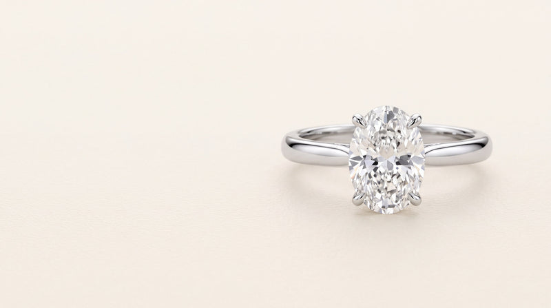 Oval cut diamond solitaire engagement ring in platinum