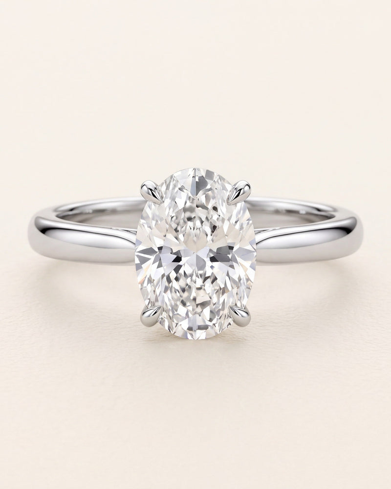 Oval cut diamond solitaire engagement ring in platinum