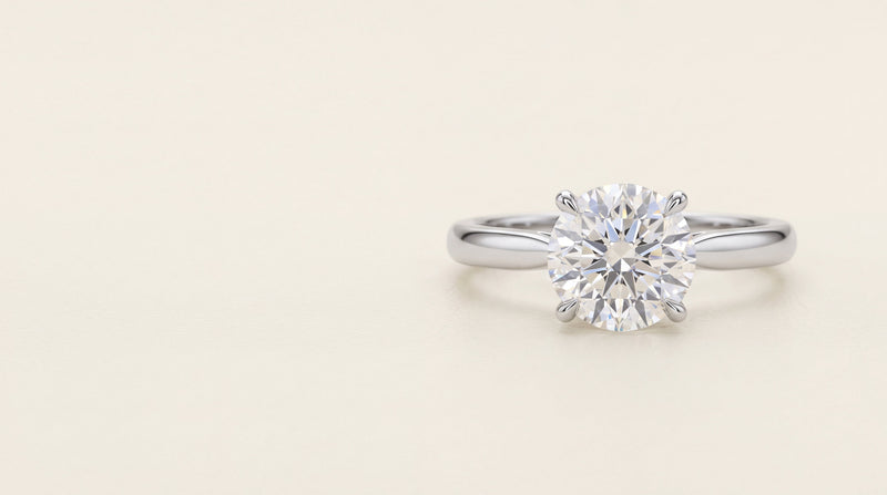 Round brilliant cut diamond solitaire engagement ring in platinum