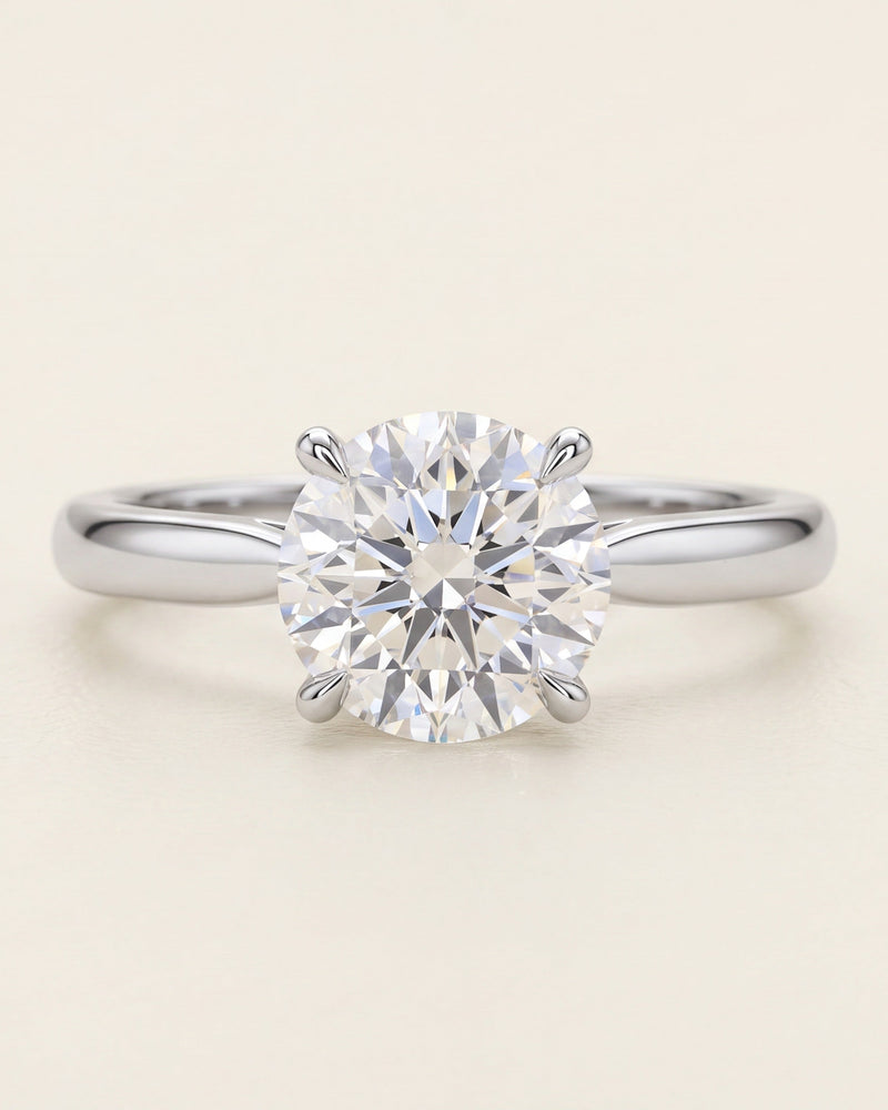 Round brilliant cut diamond solitaire engagement ring in platinum