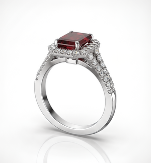 Bespoke ruby cluster ring with diamond-set shoulders, made in Hatton Garden