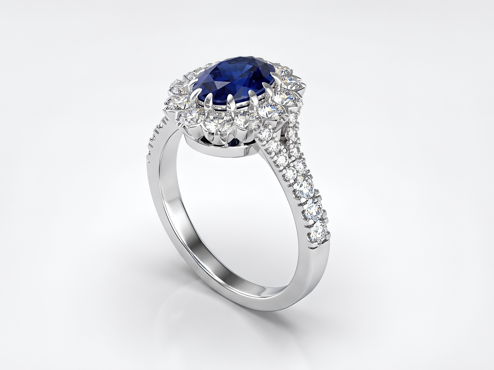 Bespoke sapphire and diamond cluster ring, made in Hatton Garden